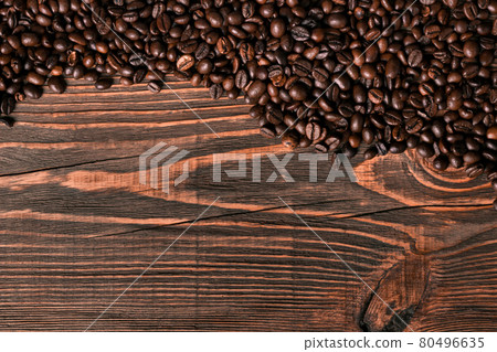 Coffee beans on wooden background Coffee beans on wooden background 80496635