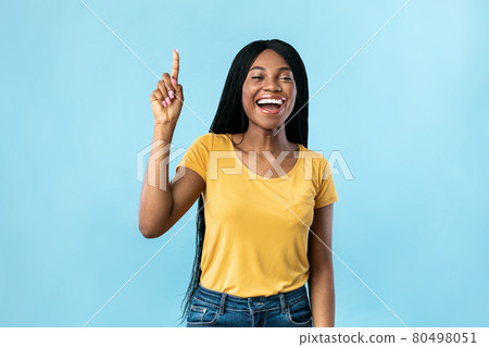 Excited African Female Pointing Finger Up Having Idea, Blue Background 80498051