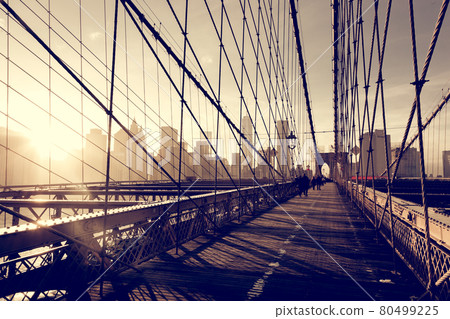 Brooklyn bridge at sunset, New York City. Brooklyn bridge at sunset, New York City. 80499225
