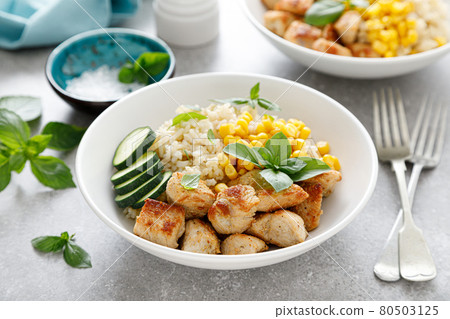 Fried turkey breast and rice with vegetables Fried turkey breast and rice with vegetables 80503125
