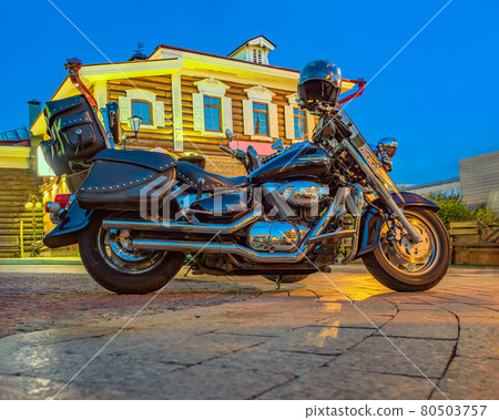 Motorbike is parking on the street of the night city. Motorbike is parking on the street of the night city. 80503757