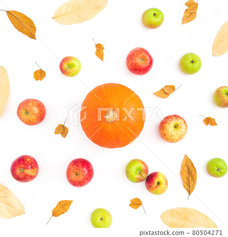 Autumn background with fall leaves, apple and pumpkin on white background. Flat lay, top view Autumn background with fall leaves, apple and pumpkin on white background. Flat lay, top view 80504271