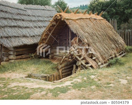 Traditional medieval wooden buildings at archaeological heritage village near Velehrad Monastery, Modra, Moravia, Czech Republic, sunny summer day Traditional medieval wooden buildings at archaeological heritage village near Velehrad Monastery, Modra, Moravia, Czech Republic, sunny summer day 80504379