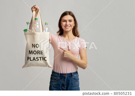 Eco-Activism Concept. Female Pointing At Tote Bag With No More Plastic Inscription 80505231