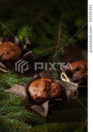Delicious chocolate muffins Delicious chocolate muffins 80505381