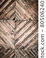 Geometric abstract closeup of natural aged and rural rustic wood surface of recycled weathered planks constructed in creative, decorative lines, old vintage wooden background or backdrop with space 80506240