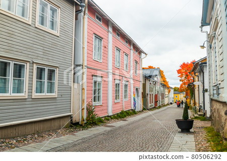 Porvoo, Finland - 2 October 2019: Street of Old Porvoo, Finland. Beautiful city autumn landscape with colorful wooden buildings. 80506292