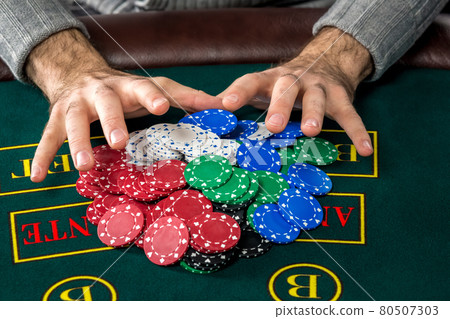 Poker play. Chips and cards Poker play. Chips and cards 80507303
