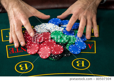 Poker play. Chips and cards 80507304