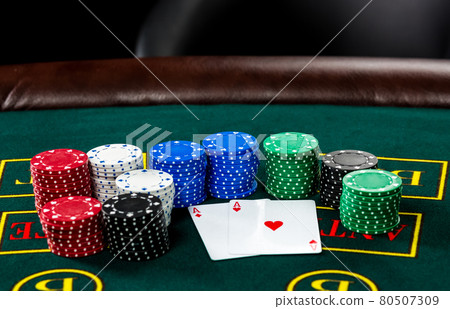 Poker play. Chips and cards Poker play. Chips and cards 80507309