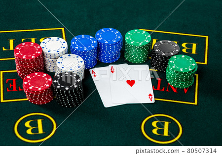Poker play. Chips and cards Poker play. Chips and cards 80507314