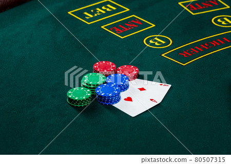 Poker play. Chips and cards Poker play. Chips and cards 80507315