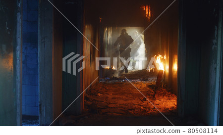 Firemen running through fire and looking for survivors Firemen running through fire and looking for survivors 80508114