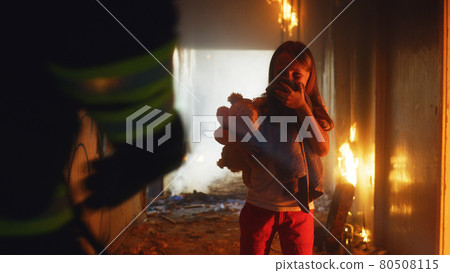Fireman carrying kid heroically through smoke and fire Fireman carrying kid heroically through smoke and fire 80508115