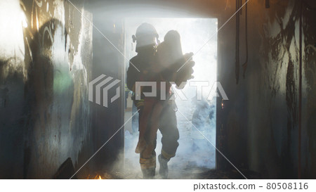 Fireman carrying kid heroically through smoke and fire Fireman carrying kid heroically through smoke and fire 80508116
