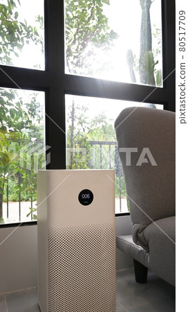 Air purifier in living room for fresh air and healthy life. Air purifier in living room for fresh air and healthy life. 80517709