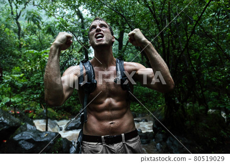 Survival man strong cheering in jungle rainforest 80519029