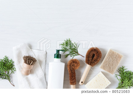 Set of different bio organic detergent products and eco-friendly bamboo brushes for home cleaning top view. 80521083