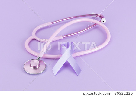 Pink stethoscope and purple ribbon, light purple background 80521220