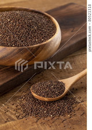perilla seed in wood bowl, scoop perilla seed in wood bowl, scoop 80521318