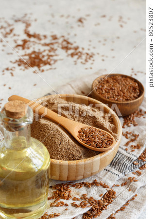 Raw Flax seeds oil, flour and seeds Raw Flax seeds oil, flour and seeds 80523807