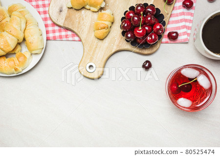 Continental breakfast with fresh fruit and coffee 80525474