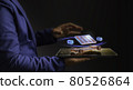 A futuristic Business man is holding a digital tablet, which a hologram is a graphic layout., Future Concept from Hologram 80526864