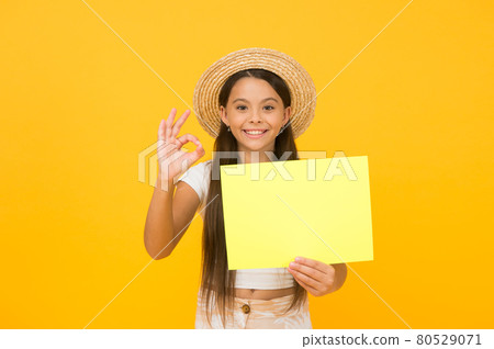 Positive mood. small girl in straw hat show ok gesture. 80529071