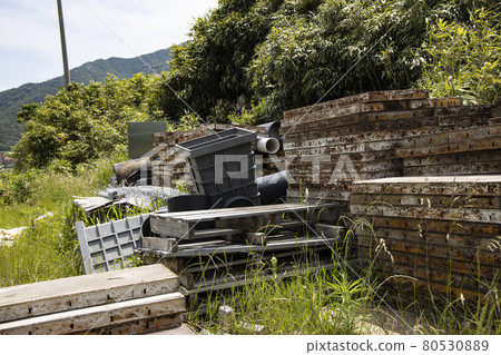 Building materials stacked outdoors Building materials stacked outdoors 80530889