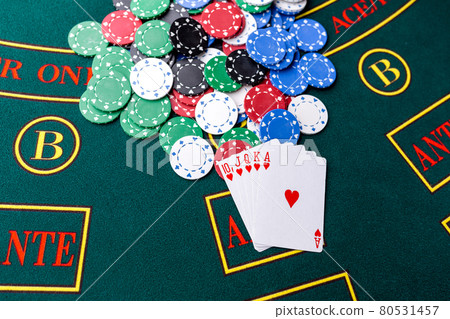 Poker chips on a table at the casino Poker chips on a table at the casino 80531457