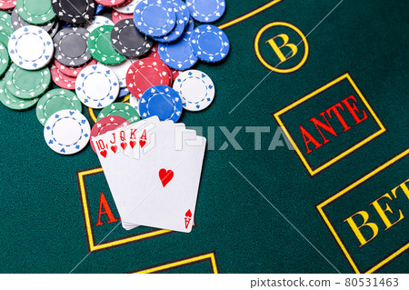 Poker chips on a table at the casino Poker chips on a table at the casino 80531463