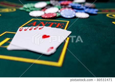 Poker chips on a table at the casino Poker chips on a table at the casino 80531471
