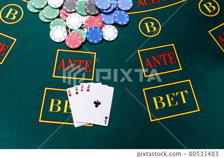 Poker chips on a table at the casino Poker chips on a table at the casino 80531483