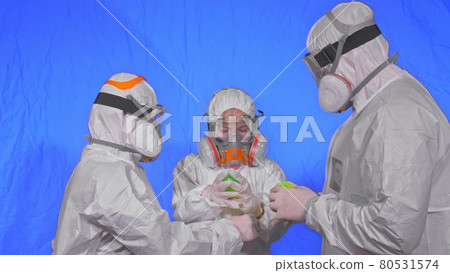 Family of doctors scientists health worker in respirator. Mom dad and daughter portrait, wearing protect medical mask. Coronavirus pandemic covid-19. 80531574