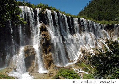 Juizhaigou (Nine Villages Valley) in Sichuan, China. View of Nuorilang Waterfall. Juizhaigou is a popular tourist destination in China famous for its waterfalls, lakes and scenic beauty. 80532132