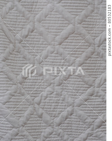 white soft cotton summer abstract patchwork pattern blanket hanging after wash in laundry. white soft cotton summer abstract patchwork pattern blanket hanging after wash in laundry. 80532183
