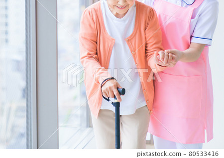Senior women and long-term care staff in long-term care facilities Senior women and long-term care staff in long-term care facilities 80533416