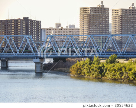An iron bridge over the Tamagawa River in Ota Ward, Tokyo An iron bridge over the Tamagawa River in Ota Ward, Tokyo 80534628