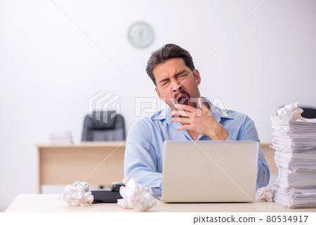 Young male employee rejecting new ideas in the office Young male employee rejecting new ideas in the office 80534917