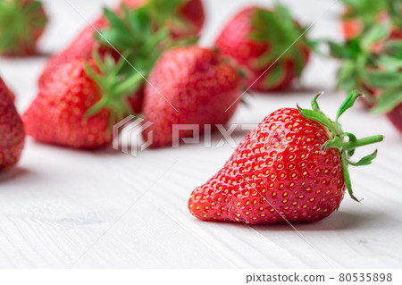 Fresh strawberry background. Ripe in close-up. Fresh strawberry background. Ripe in close-up. 80535898