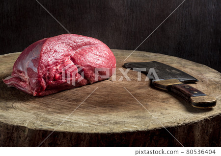 Juicy raw beef steak on wooden table 80536404