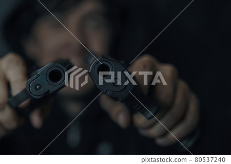 Guy threatens with firearm. Guy threatens with firearm. 80537240