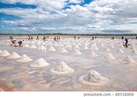Phetchaburi Salt flats Naklua, farms and farmers collecting salt in Phetchaburi, Thailand 80538808