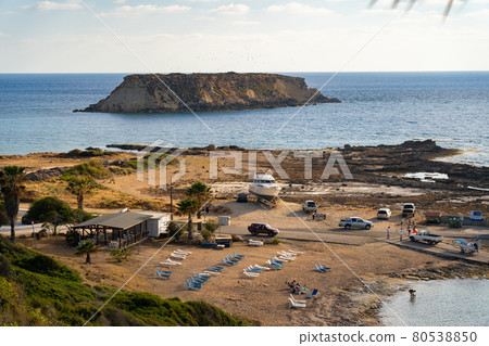 Cyprus beautiful scenic view Agios Georgios island in evening at sunset . Akamas. Agios Georgios church and harbor, Akamas, Paphos, Cyprus Cyprus beautiful scenic view Agios Georgios island in evening at sunset . Akamas. Agios Georgios church and harbor, Akamas, Paphos, Cyprus 80538850