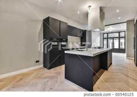 Interior of a beautiful kitchen of an elite house Interior of a beautiful kitchen of an elite house 80540125