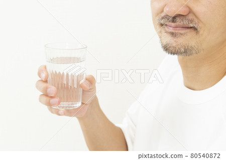 Men drinking water Men drinking water 80540872
