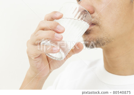 Men drinking water Men drinking water 80540875