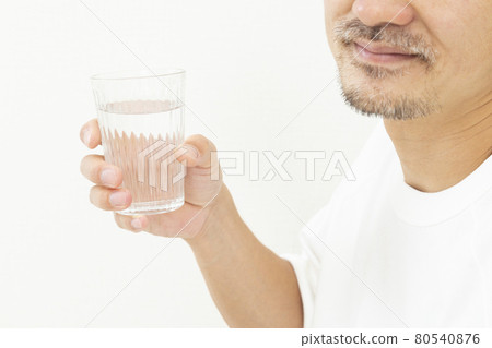Men drinking water Men drinking water 80540876