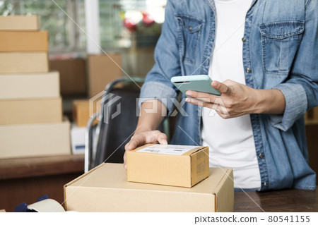 Online business owner preparing product to customer. 80541155
