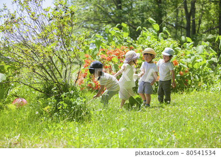 Children and nursery teachers enjoying outdoor play Children and nursery teachers enjoying outdoor play 80541534